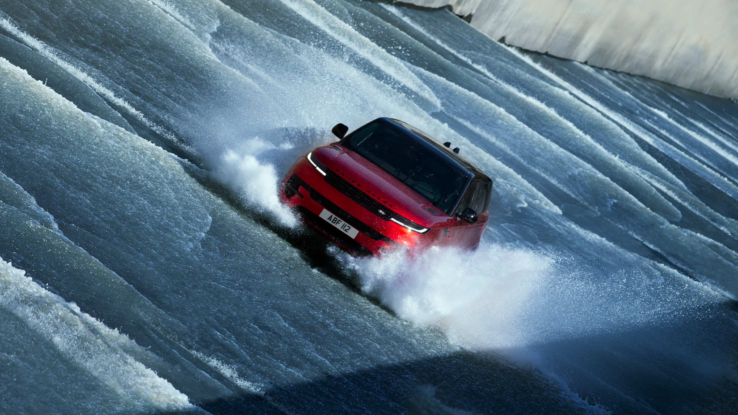 Range Rover Sport driving through water in Iceland